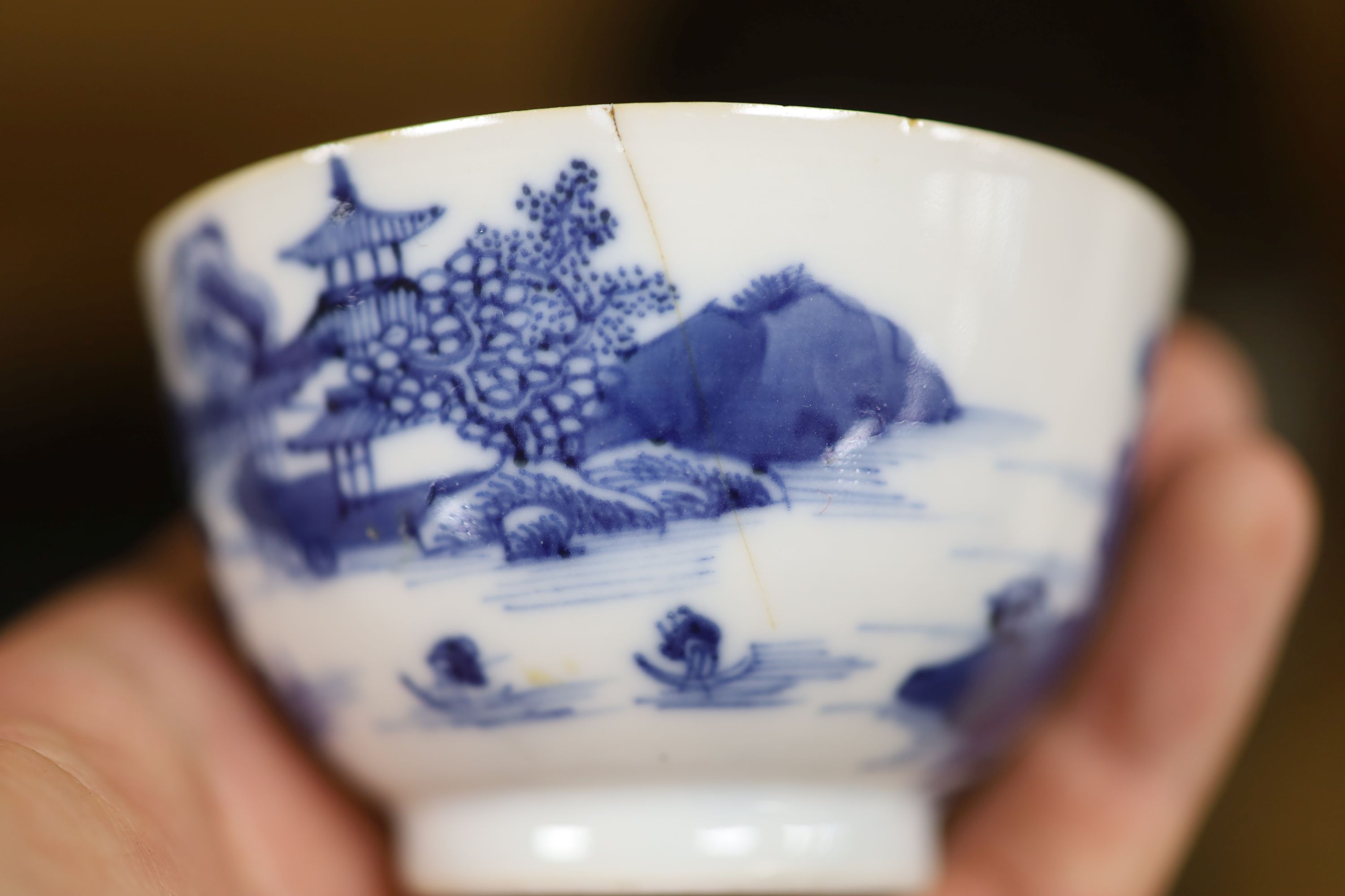 A Chinese blue and white bowl, diameter 15cm, a tea bowl and saucer, a crackleglaze shell dish and a celadon glazed stem cup